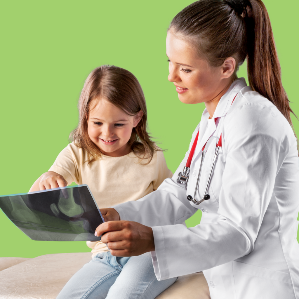 child doctor looking at x-ray