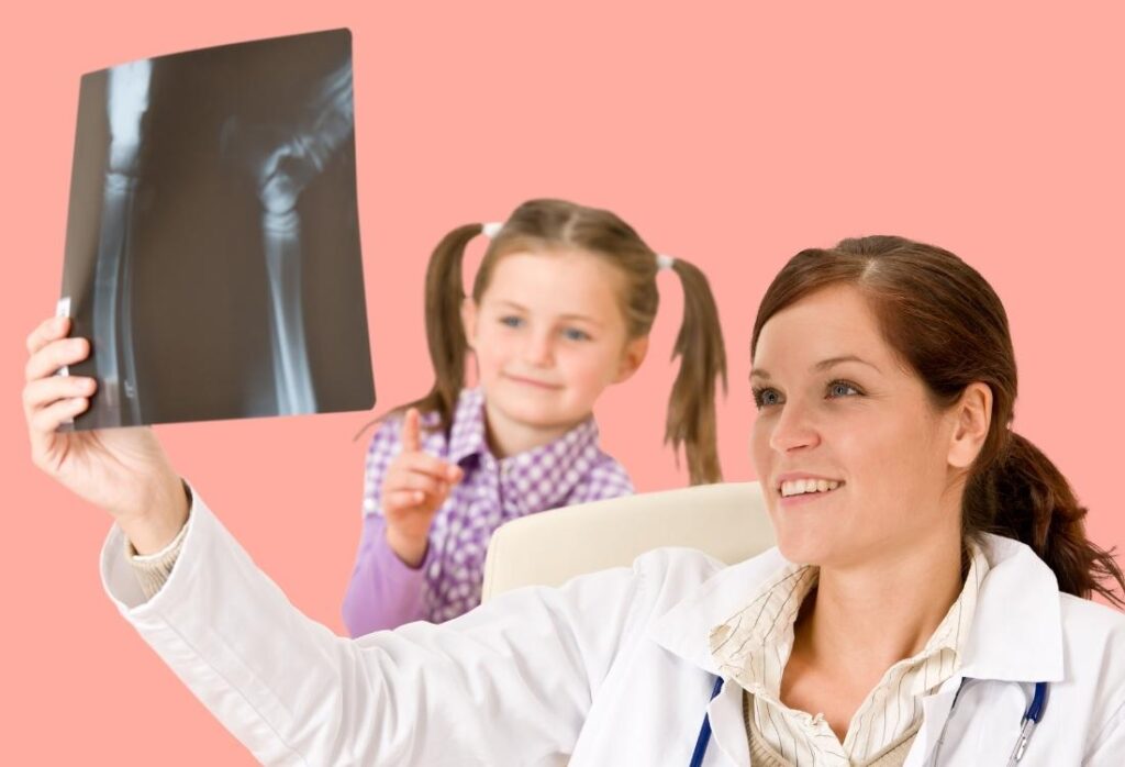 doctor and child looking at x-ray