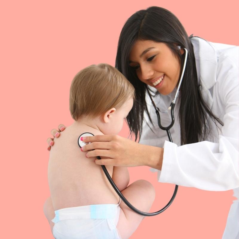 doctor listening to child's lungs and breathing